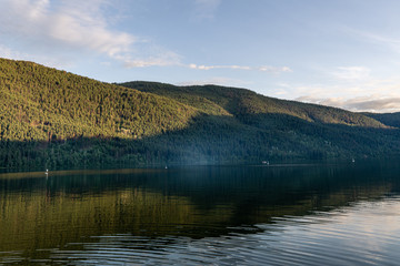 beautiful day at paul lake with blue sky and white clouds british columbia canada.