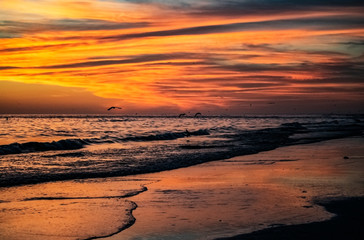 Fototapeta na wymiar sunset on the beach, sea, sky, ocean, sunset, water, sun, clouds, waves, sand, landscape, coast, 