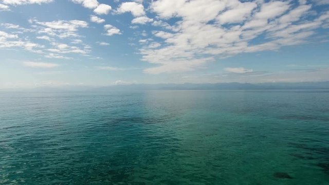 Tranquil Water with Misty Mountains at Isla Escudo, Panama
