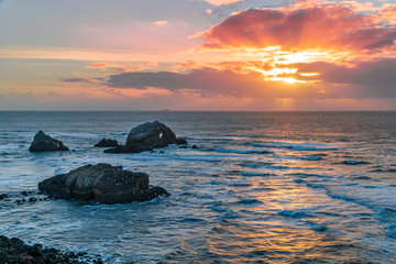 Fototapeta na wymiar Relaxing and calm ocean sunset view from Sutro Baths, San Francisco, California
