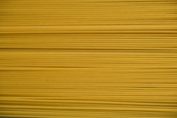 Spaghetti on the grey background