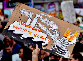 hand holding a sign