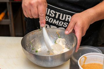 whisking marinated for ceviche