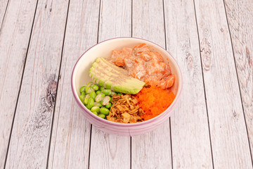 Poke bowl with fish and vegetables