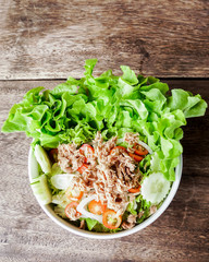 Tuna salad in white bowl.