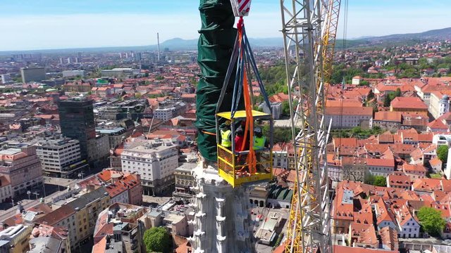 Zagreb Cathedral North Tower, damaged in Earthquake, preparing for controlled demolition by alpinists - Aerial Drone View
