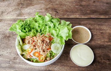 Tuna salad in white bowl.