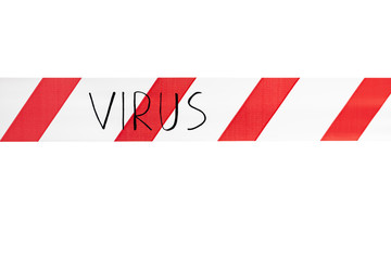 Label virus. Red and white warning tape with the inscription virus close up on an isolated white...