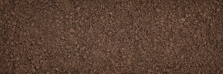 soil texture closeup, ground surface as background