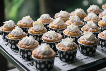 many cupcakes on table for lunch