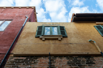 Italian style wooden faces, colorful Italian-style architecture.