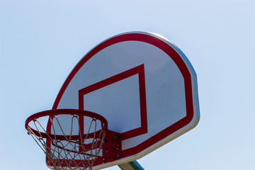 Basketball Hoop in a Blue Sky
