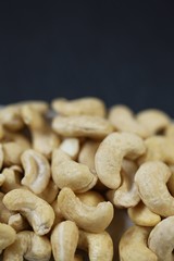 Cashew nuts on a black background.Cashew nut background.Useful fats.Organic vegan bio product.healthy snack 