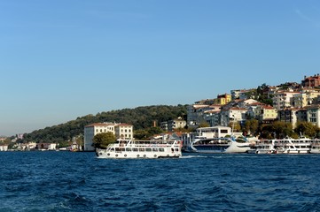 Fototapeta na wymiar Passenger ships in the Bosphorus Strait at the Uksyudar Shehir Khatlary Isklesi Maritime Station on the Asian side of Istanbul