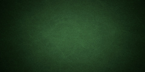 Elegant dark emerald green background with black shadow border and old vintage grunge texture design
