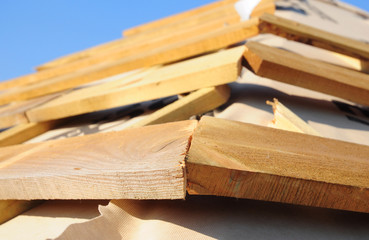 A close-up on moisture, vapor barrier installed under purlins, strapping, roof frame, trusses to avoid condensation and moisture in roofing construction.