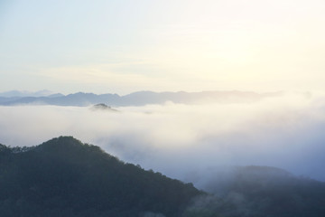 Fototapeta na wymiar landscape, fog and cloud mountain valley , Morning fog , Sun rises .