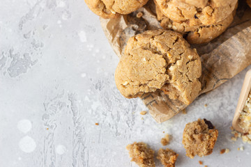 Homemade vegan cookies with buckwheat, raisin and nuts. Healthy sweet snack. Light grey stone background. Top view.