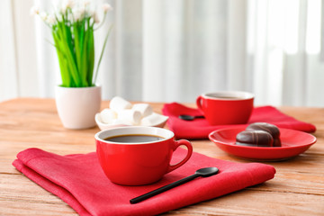 Cup of coffee on table in cafe