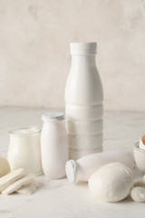Different dairy products without lactose on light background