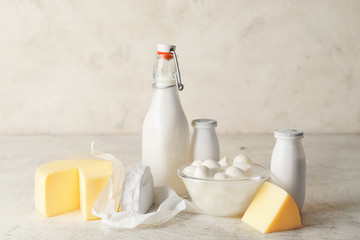 Different dairy products without lactose on light background