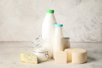 Different dairy products without lactose on light background