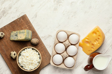 Different dairy products without lactose on light background