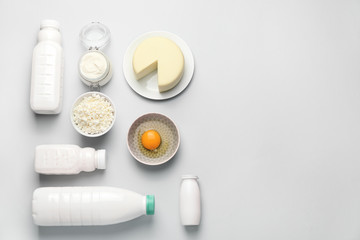 Different dairy products without lactose on light background