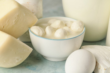 Different dairy products without lactose on color background