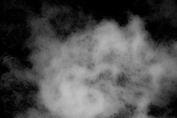 white powder explosion on Black background. Colorful dust explode. Paint Holi.