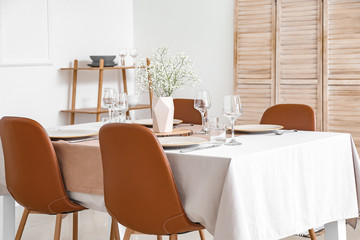 Served table in modern dining room
