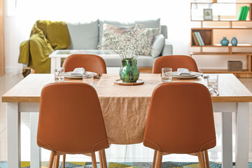 Served table in modern dining room
