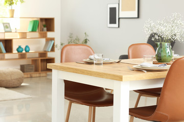 Served table in modern dining room