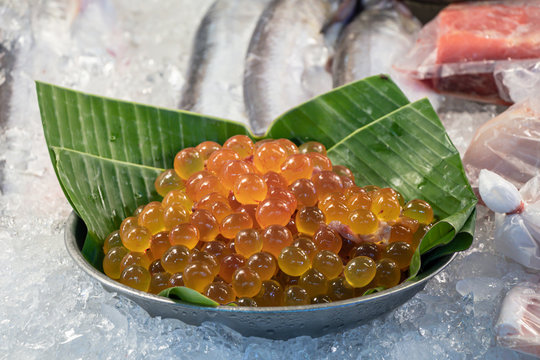 Close-up fresh Giant catfish roe on plate in seafood market.