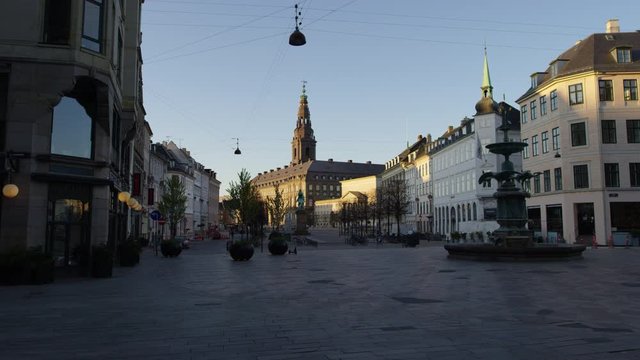 Empty Amagertorv during covid-19 with no people and Christianborg in bg