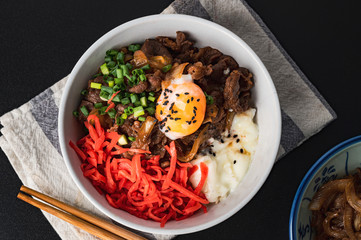 GYUDON Japanese beef & Rice,Japanese traditional dish Gyudon made from thinly sliced beef, onion, soy sauce and rice,food concept background