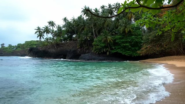 The beautiful Piscina beach on a rainy day in island of Sao Tome and Principe - Africa