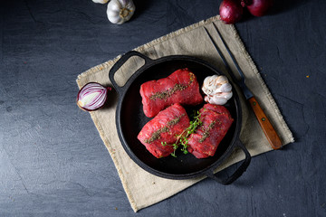 raw beef roulades prepared for cooking
