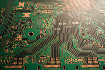 A close-up of Green coloured Solder resits Printed circuit board (PCB) with no component mounted...