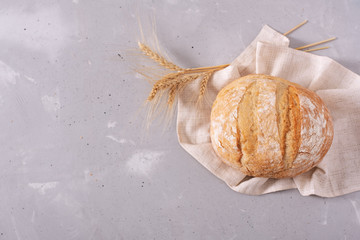 Fototapeta na wymiar Fresh homemade crisp bread, top view. French bread. Bread at leaven. Unleavened bread