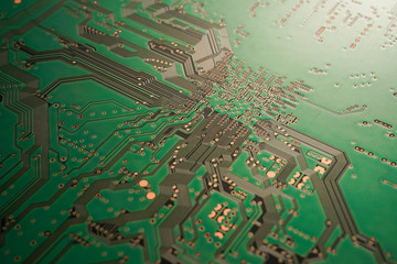 A close-up of Green coloured Solder resits Printed circuit board (PCB) with no component mounted (copper exposed)