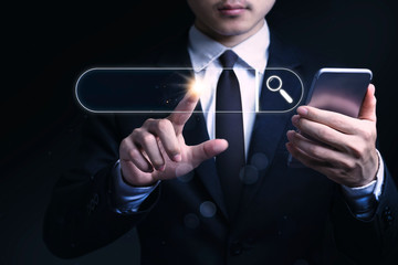 Businessmen Asia Searching browsing internet data Information networking on virtual screen pressed with finger and shows the internet connection, international and global social media. Search concepts