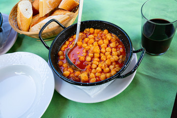 Healthy  food of chickpeas with tripe with red  sauces