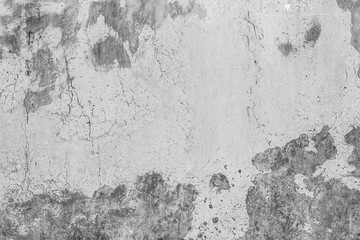 White concrete wall with black stains as background