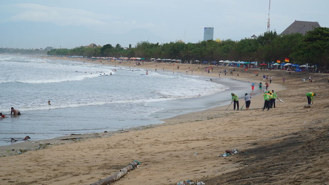 Janitor is carrying out activities Kuta Beach, Bali, Indonesia, January 29, 2017.