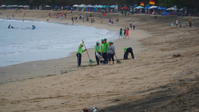 Janitor is carrying out activities Kuta Beach, Bali, Indonesia, January 29, 2017.