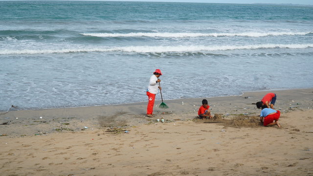 Janitor is carrying out activities Kuta Beach, Bali, Indonesia, January 29, 2017.