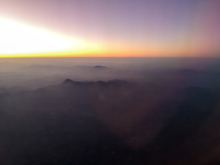 Sunset over the mountains of planet Earth.