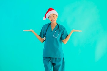 Portrait beautiful young asian doctor woman wear christmas hat