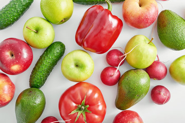 Different vegetables and fruit isolated on white background.